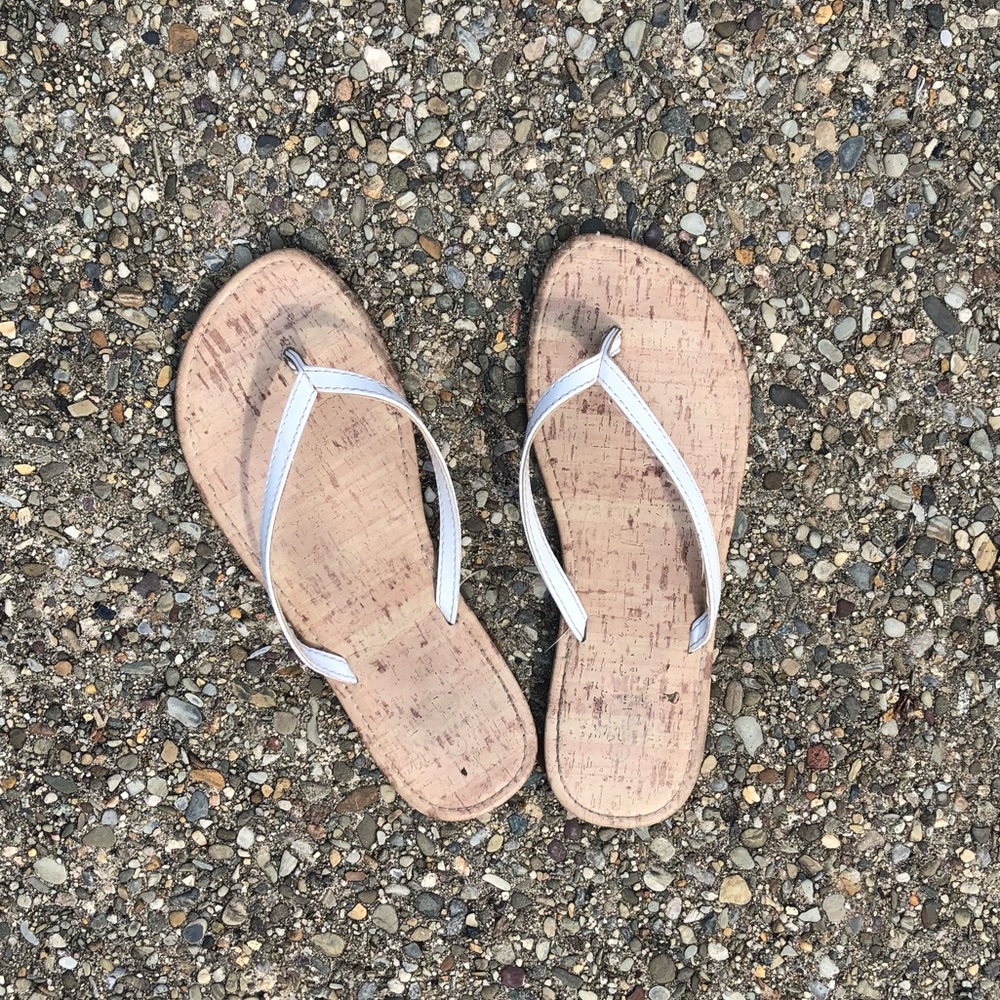 White beachy flip flops
